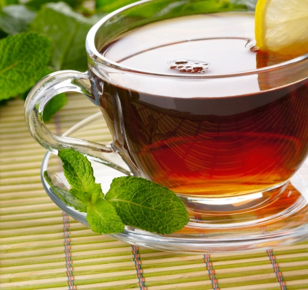 Cup of tea with lemon and mintの写真素材
