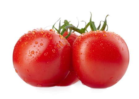 Tomato vegetables pile isolated on white backgroundの写真素材