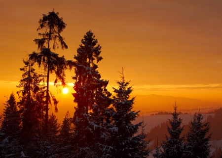 Beautiful sunrise in the winter mountainsの写真素材