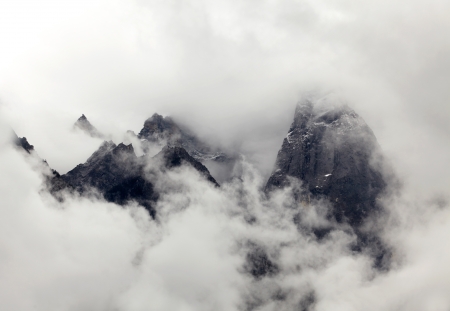High mountains in the cloudsの写真素材