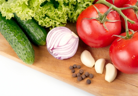 Fresh vegetables on wooden hardboardの写真素材