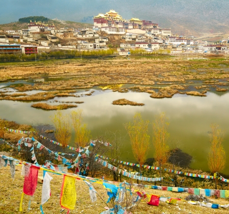 Landscape with tibetan monastery and lakeのeditorial素材