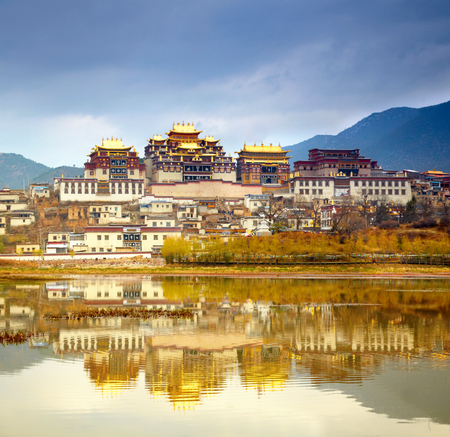 Landscape with tibetan monastery and lakeのeditorial素材