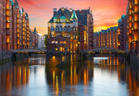 Old Speicherstadt in Hamburg illuminated at night. Sunset backgroundのeditorial素材