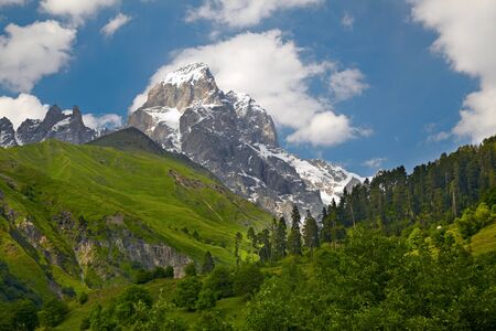 Sunny morning scene with Caucasus mountains. Svanetia, Georgiaの写真素材