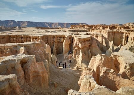 QESHM ISLAND, IRAN - Febrary 28, 2016: People walking through Stars Valley. Mountain range at Qeshm Island, Iranのeditorial素材