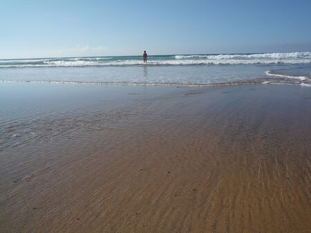 Low evening light on a Tindaya beach Fuerteventura Canary islandsの写真素材