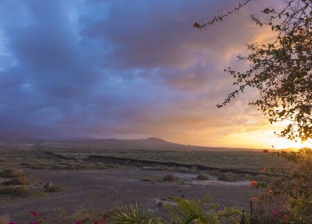 Sunset View of mountains  and colourful colourful dramatic sky  in Fuerteventura Canary islands Las palmas Spainの写真素材