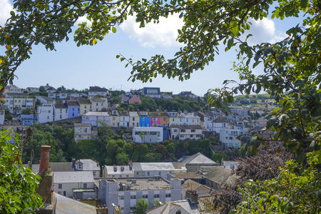 View of colourful colorful houses Brixham Torbay (English Riviera) Devon Endland UK overlooking townの写真素材