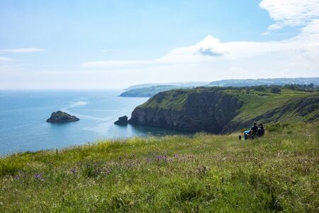 Beautiful Brixham landscape from Berry Head Brixham Devon England looking out to a calm seaの写真素材