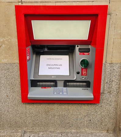 Photograph of an out-of-service ATM on a deserted street. Image taken in Salamanca, Castilla y Leon, Spain.の写真素材