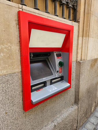 Photograph of an ATM in a street in Spain, in a street in Salamanca, Castilla y Leon.の写真素材