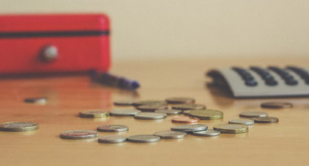 coins and calculator.の写真素材