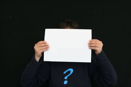 girl with a white paperの写真素材