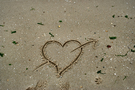 heart in the sand - valentine messageの写真素材