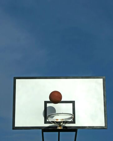 ball in basket in old basketball table - sport symbolsの写真素材