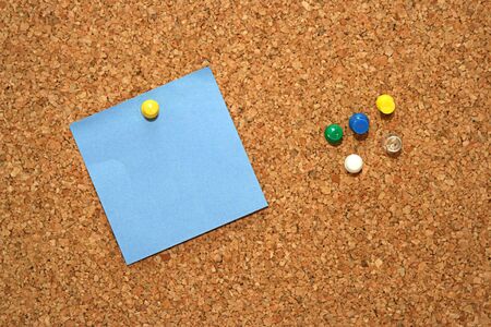 blue empty note in cork boardの写真素材