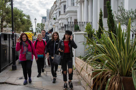 london, united kindom, 09/27/209. People walk in the Earl's Court neighborhood.のeditorial素材