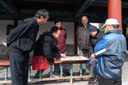 Beijing, 02/2019. The Temple of Heaven. people playing majiang.のeditorial素材