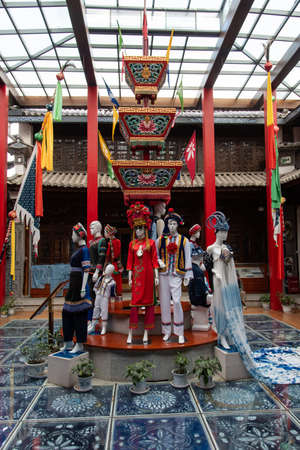 Zhoucheng Village It has earned the nickname \ 'the Hometown to Tie-dyeing \'. The delicate and colorful dyeing process appeals to many travelers at both home and abroad. travelers can have a view of the tradtional architecture and daily life of Bai ethniのeditorial素材