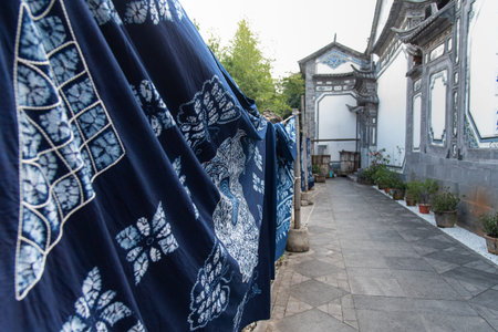 Zhoucheng Village It has earned the nickname? The Hometown to Tie-dyeing ?. The delicate and colorful dyeing process appeals to many travelers at both home and abroad. travelers can have a view of the tradtional architecture and daily life of Bai ethnic mのeditorial素材