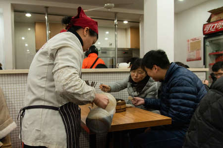 February 2019, Shanghai. Small restaurant where they only serve dumplingsのeditorial素材