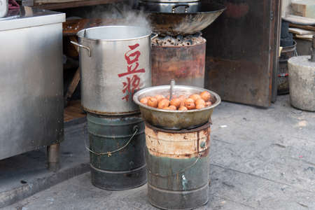 DALI, CHINA. February 2019. Commercial activities along the main street of the townのeditorial素材