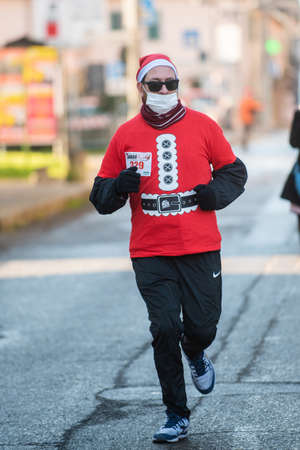 Bibbiano, December 2021. Nice annual non-competitive Santa Claus raceのeditorial素材