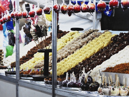 Countertop with homemade sweets, cocadas, moleque feet, pa?ocas, cajuzinhos and apples of love.の写真素材