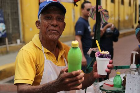 PANAMA CITY, AUGUST 2014. Artisanal slush seller in Panama City old town.のeditorial素材