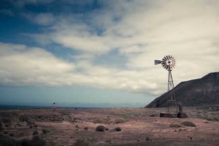 Windmill, Lanzarote, Spain. Renewable energy or wind power background and concept. Copyspace.の写真素材