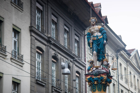 Blindfolded Justice statue fountain in Kramgasse street, Bern, historical center, Switzerlandの写真素材
