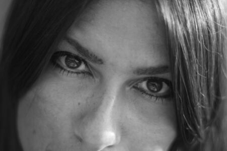 Young woman close up portrait in black and white.の写真素材
