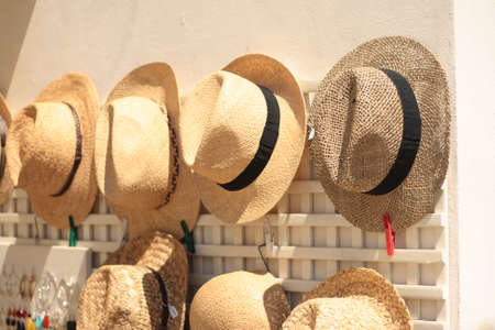 Straw hats souvenirs on sale, Italy.の写真素材