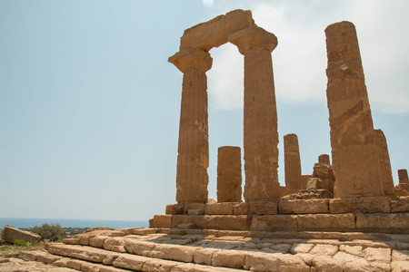 Giunone temple, Temples Valley, Valley of the Temples, Sicily, Italy. Backlit image, with copy space.の写真素材