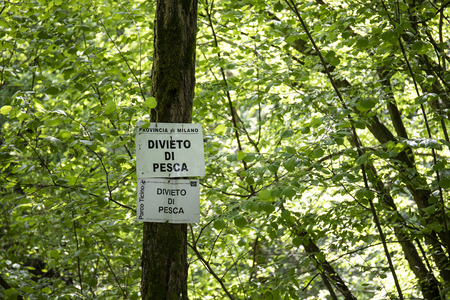 Italian language no fishing signs in parco ticino woodland, Lombardy, Italyの写真素材