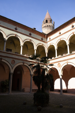 The inner courtyard with the characteristic tower. Rivalta castle, Emilia Romagna, Italy. Vertical shot.のeditorial素材