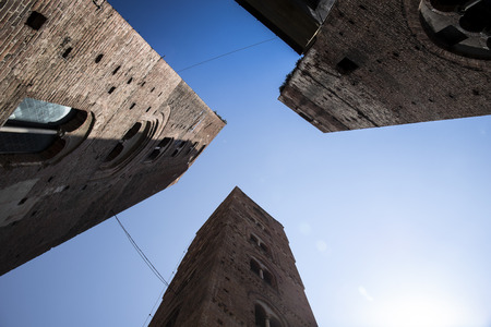 The three towers, symbol of the town of Albenga, Liguria, Italy. Blue sky, down-top perspective.のeditorial素材