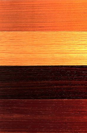Wood plank board background with a selection of different veneersの写真素材