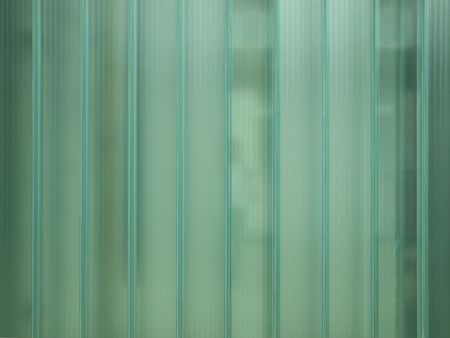 Green glass useful as a backgroundの写真素材