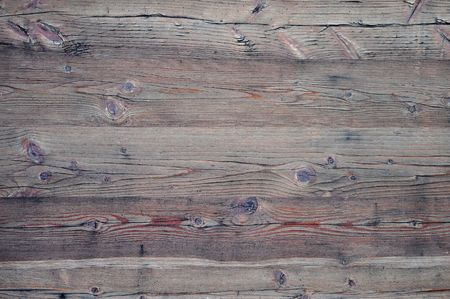 Detail of an old wood plank board backgroundの写真素材
