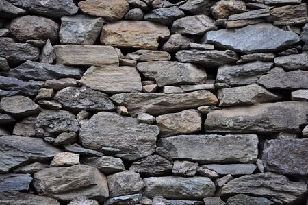 Detail of stone wall useful as a backgroundの写真素材