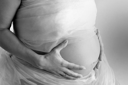 Detail of belly of a pregnant girl