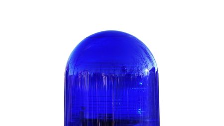 Coloured led strobe rotating police car light - isolated over white backgroundの写真素材