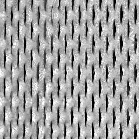 Steel grid mesh useful as a backgroundの写真素材