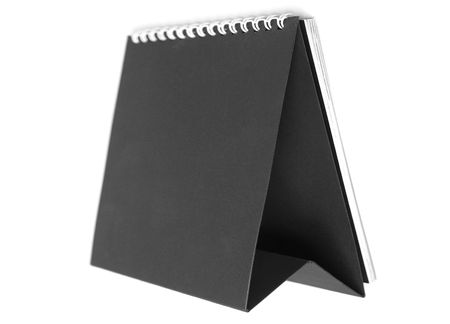 Spiralled notebook or calendar isolated over whiteの写真素材