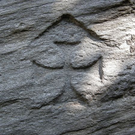 Cross carved in stoneの写真素材