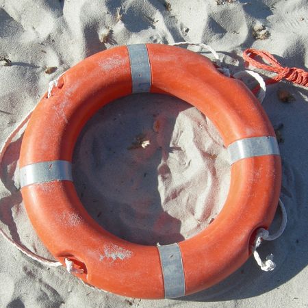 Isolated orange life buoyの写真素材