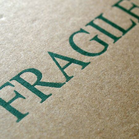 Detail of a fragile corrugated cardboard packetの写真素材