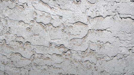 Raw concrete wall useful as a backgroundの写真素材